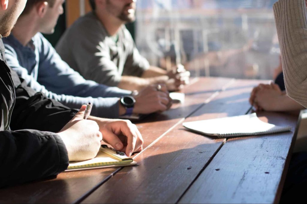 Members of an event organizing team on a discussion.