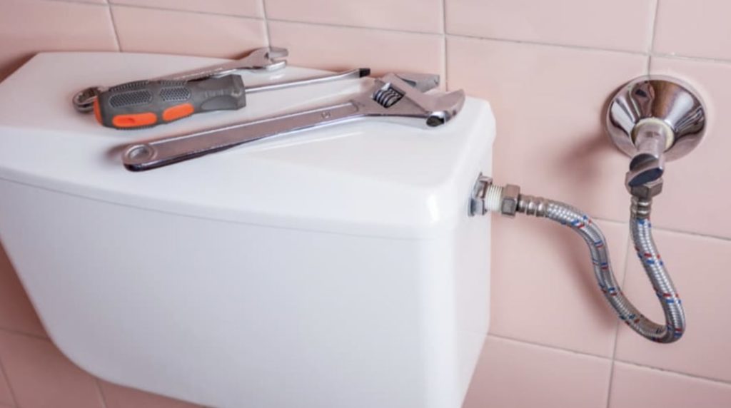 How to Remove the Toilet Tank and Lid
