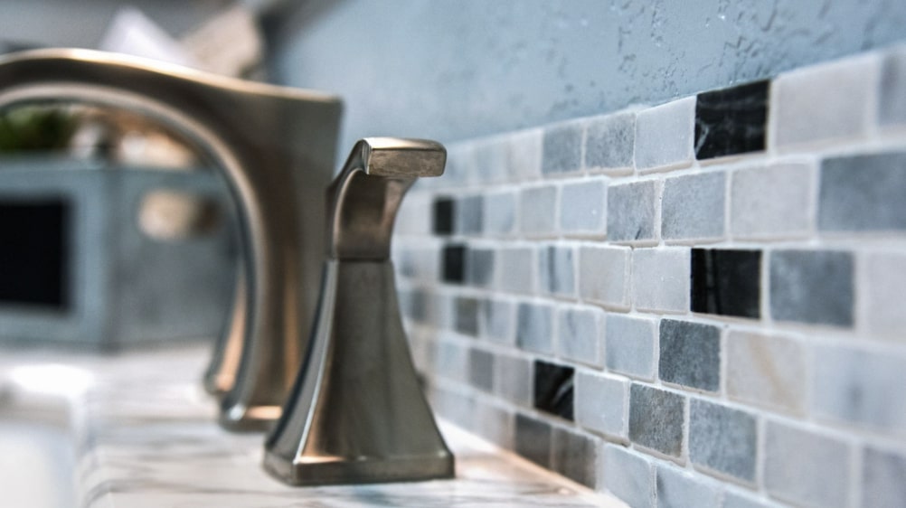 Incorporate tiles or glass decor