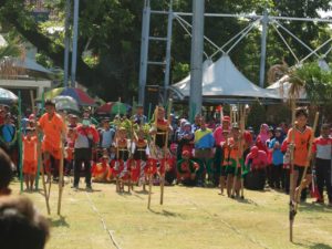 The community participates in traditional games