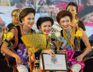 Young women compete at the Unduk Ngadau Pageant